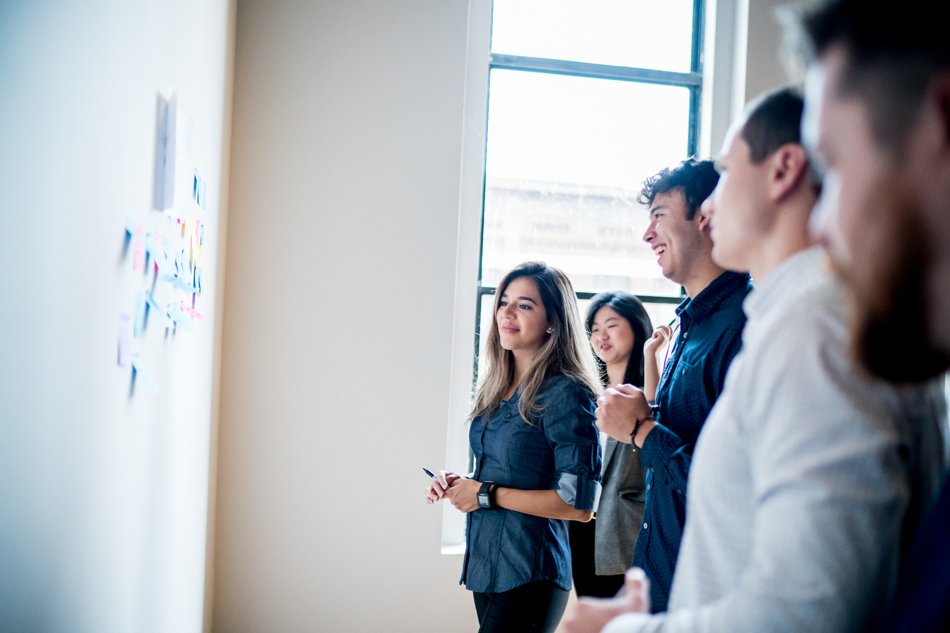 Team collaborating at a whiteboard